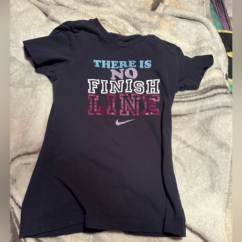 Small Teens Nike shirt.